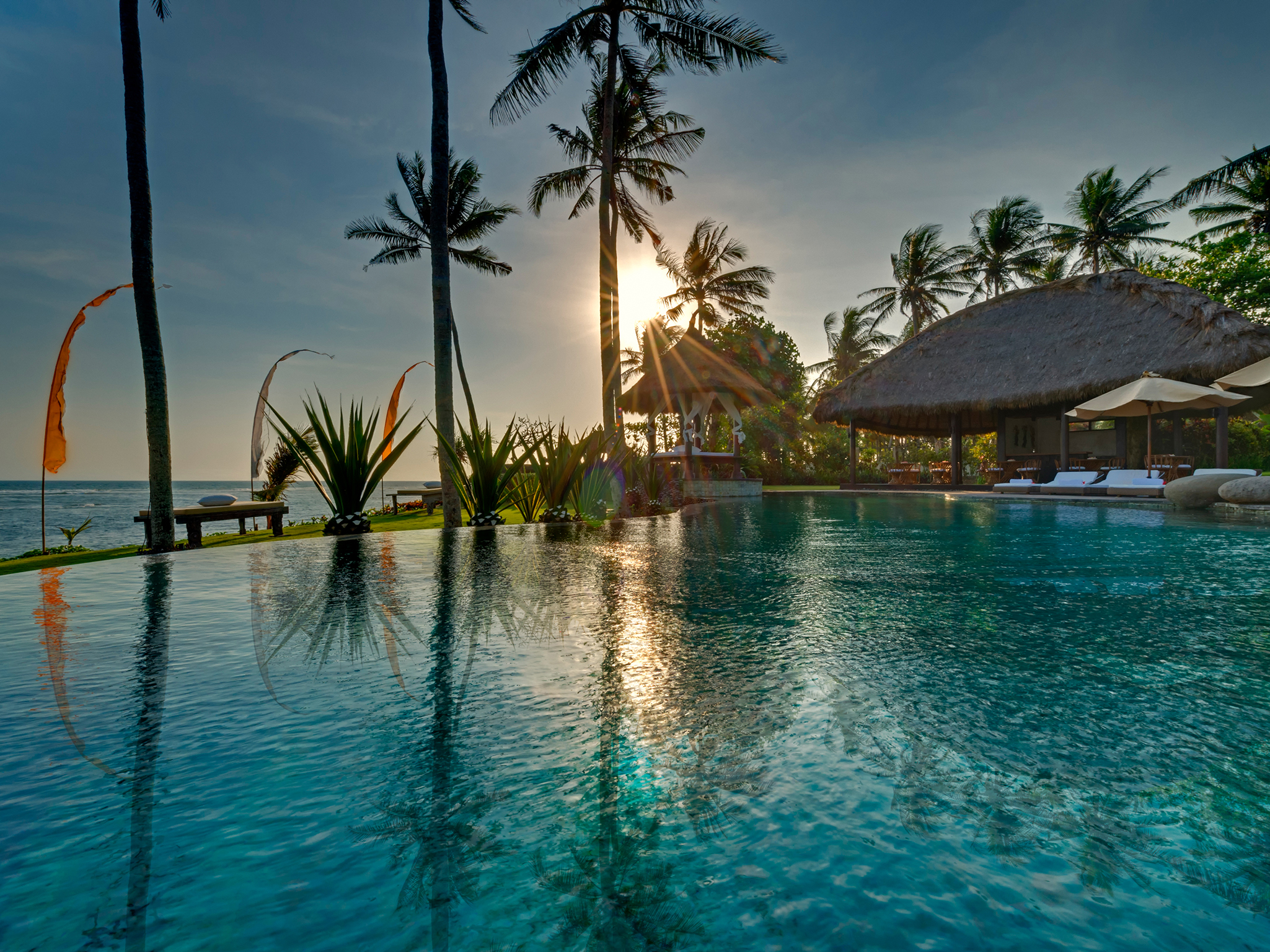 Taman Ahimsa - View across pool at sunset - Taman Ahimsa, Seseh-Tanah Lot, Bali